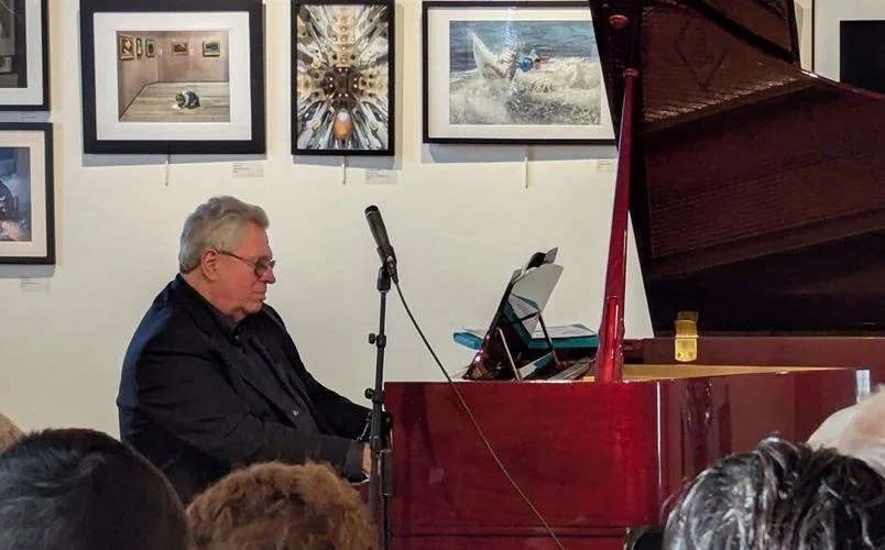 Chris DeVito performing live at the piano